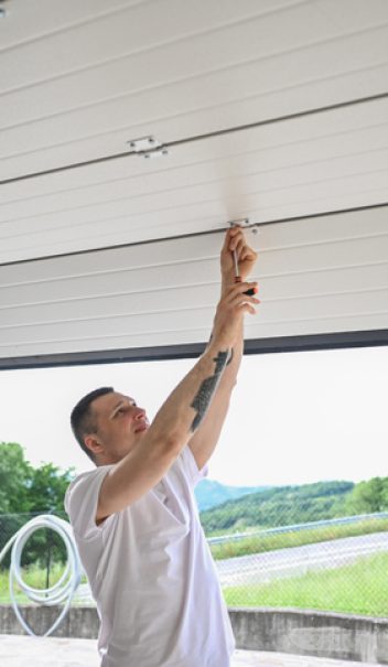 Repair of rolling garage door.